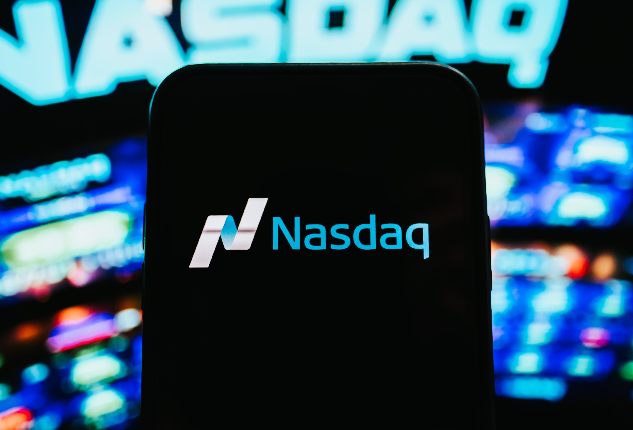 nasdaq agrees to buy adenza