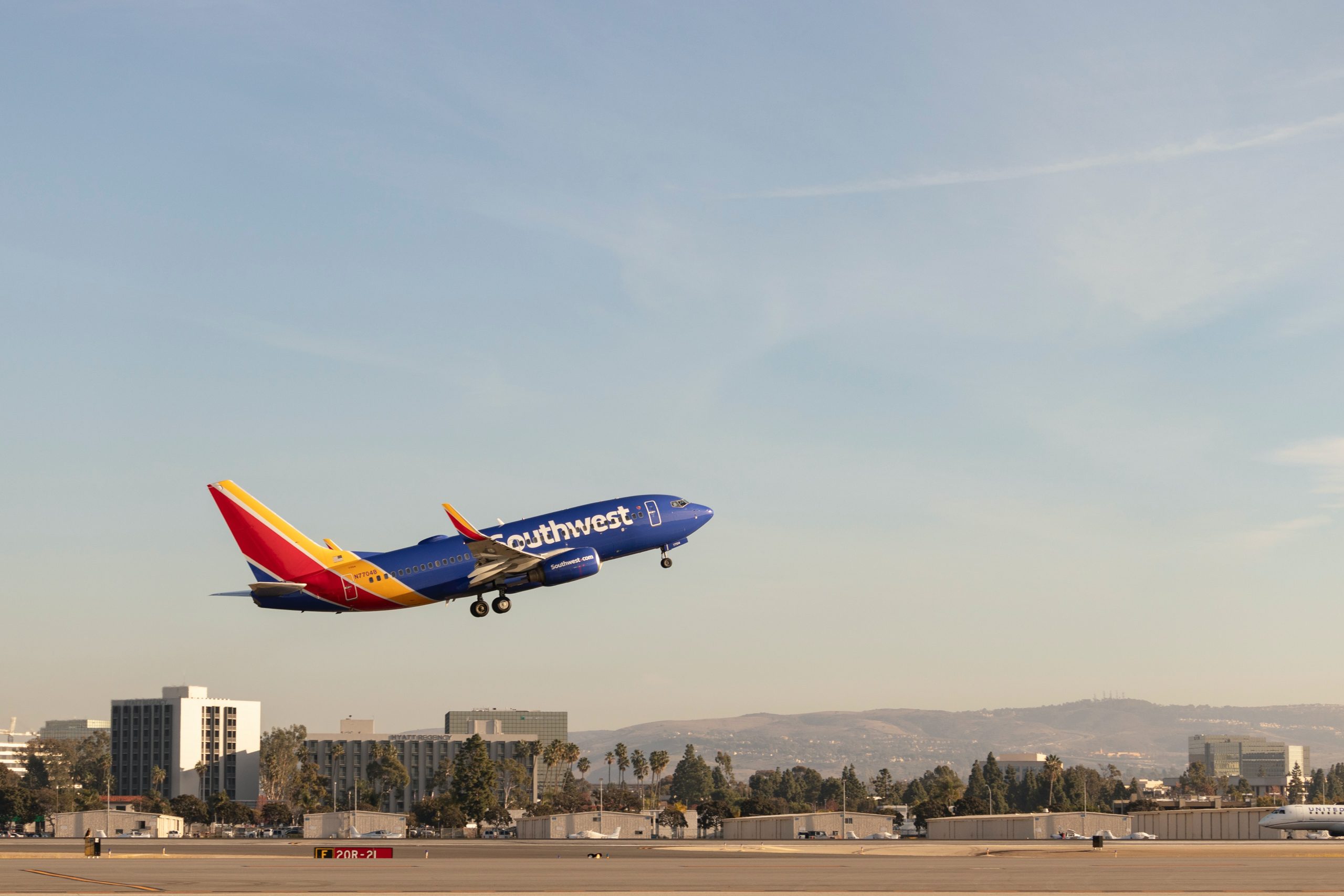 southwest airlines stock downgraded weak guidance