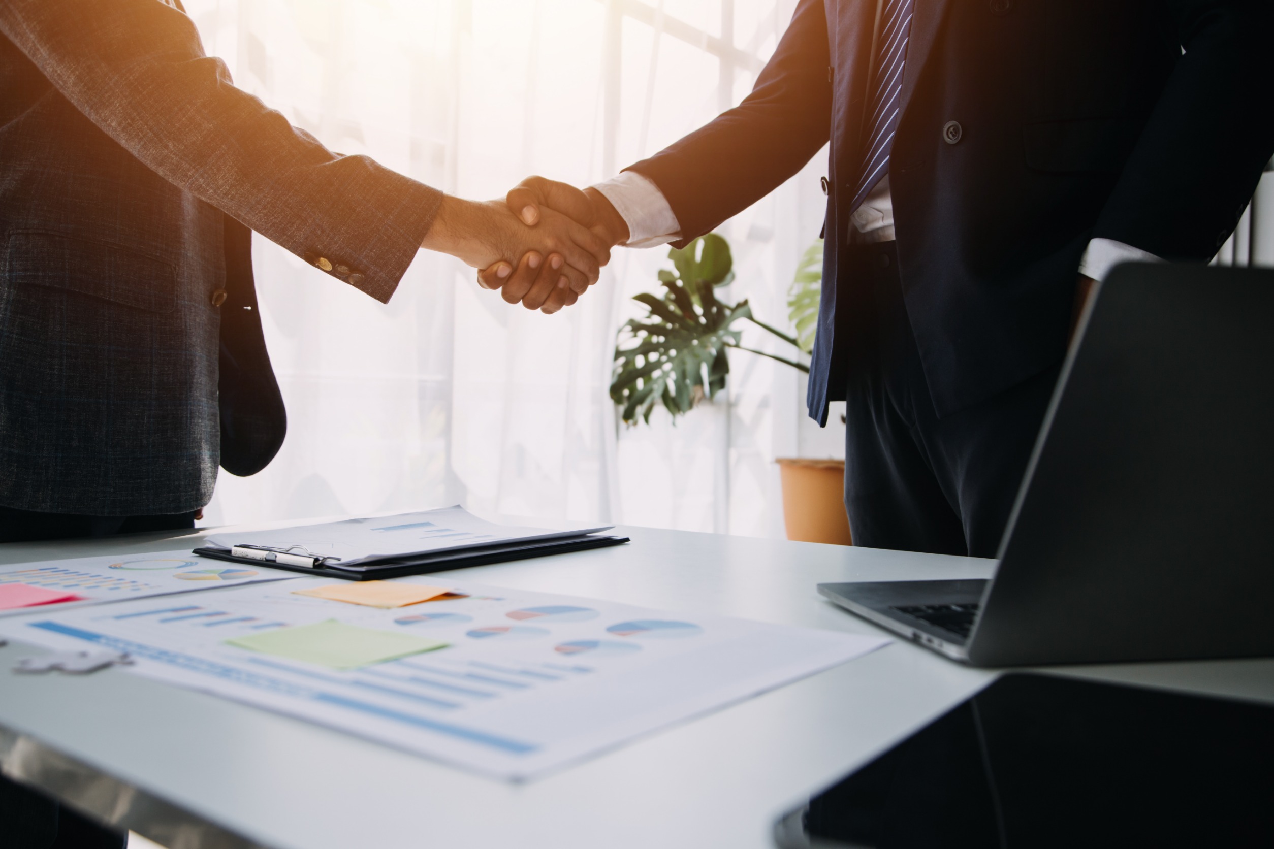 Business Handshake for Teamwork of Business Merger and Acquisition